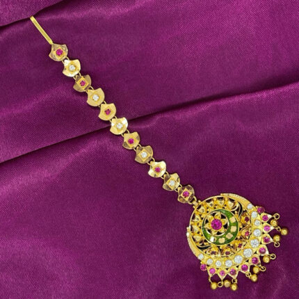 Beautiful gold maang tikka